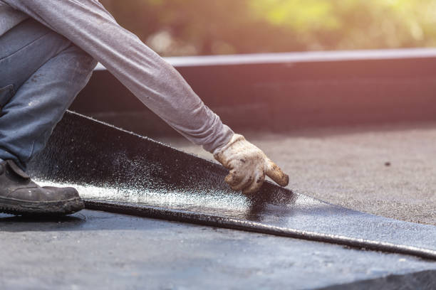 Professional Waterproofing technician working in Rogersville, AL